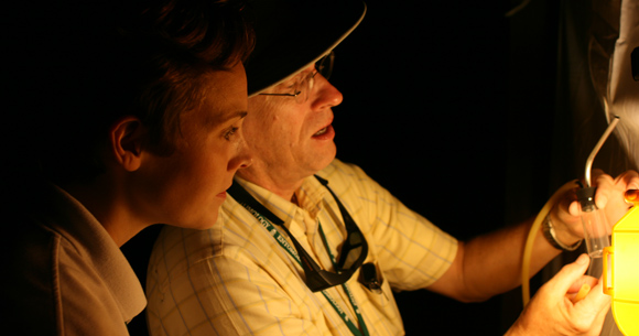 Molly Keck, Texas AgriLife entomologist, and Dr. Rick Shepherd from Tarrant County examine a nighttime catch from a light sheet