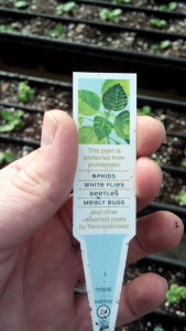 New labeling for some plants sold by The Home Depot alerts the  consumer to neonicotinoid-treated plants.