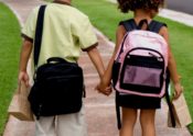 kids walking to school with backpacks